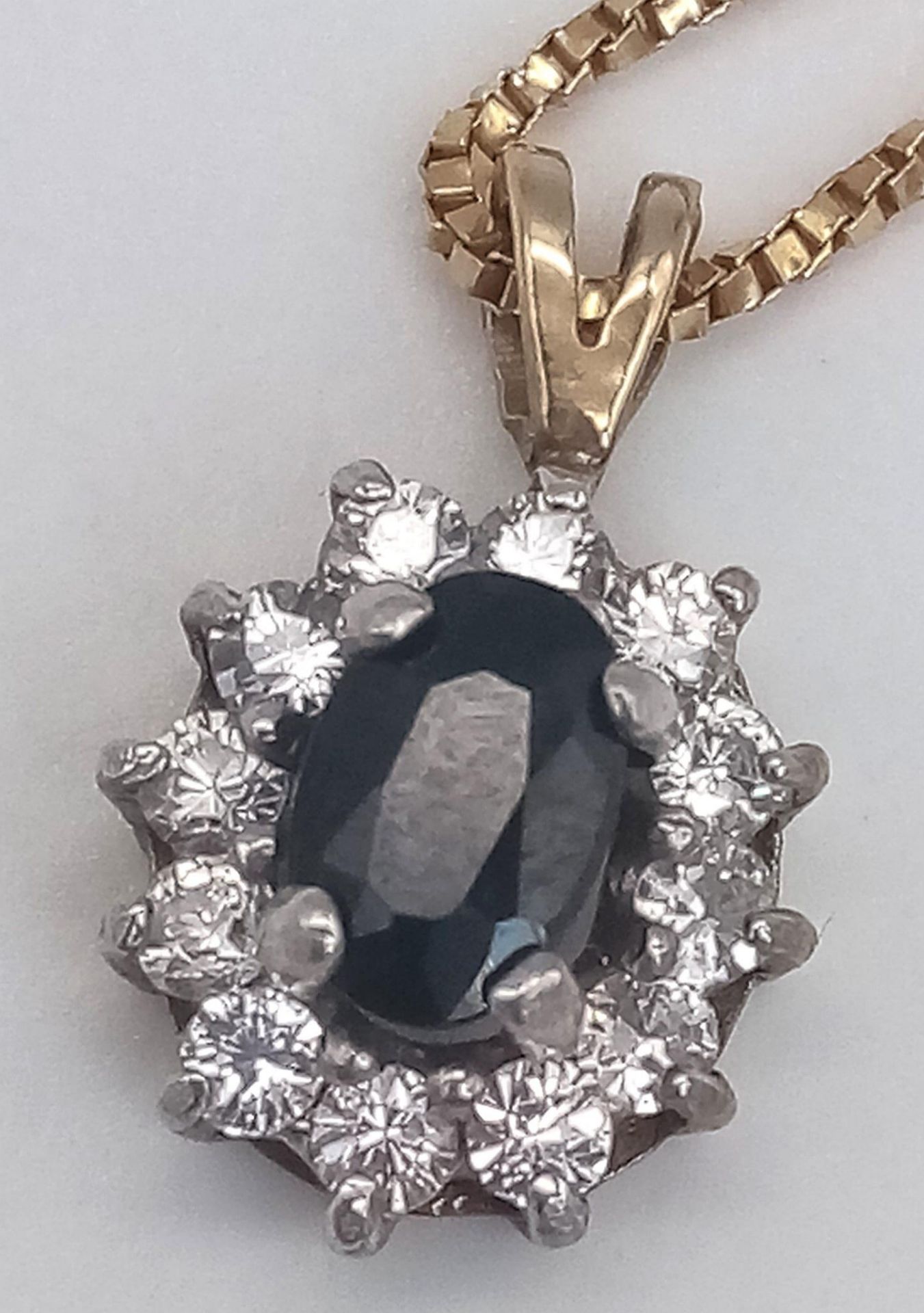 A Sapphire and Diamond Pendant set in 9K Gold on a 9K Yellow Gold Disappearing Necklace. 15mm and - Image 3 of 6