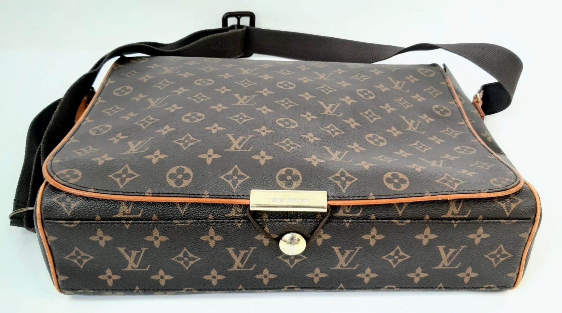 A Louis Vuitton Abbesses Messenger Bag. Monogram canvas exterior with brown leather trim. Sturdy - Image 6 of 7