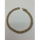 Fabulous 9 carat GOLD and DIAMOND TENNIS BRACELET , Consisting a fully hallmarked gold bracelet