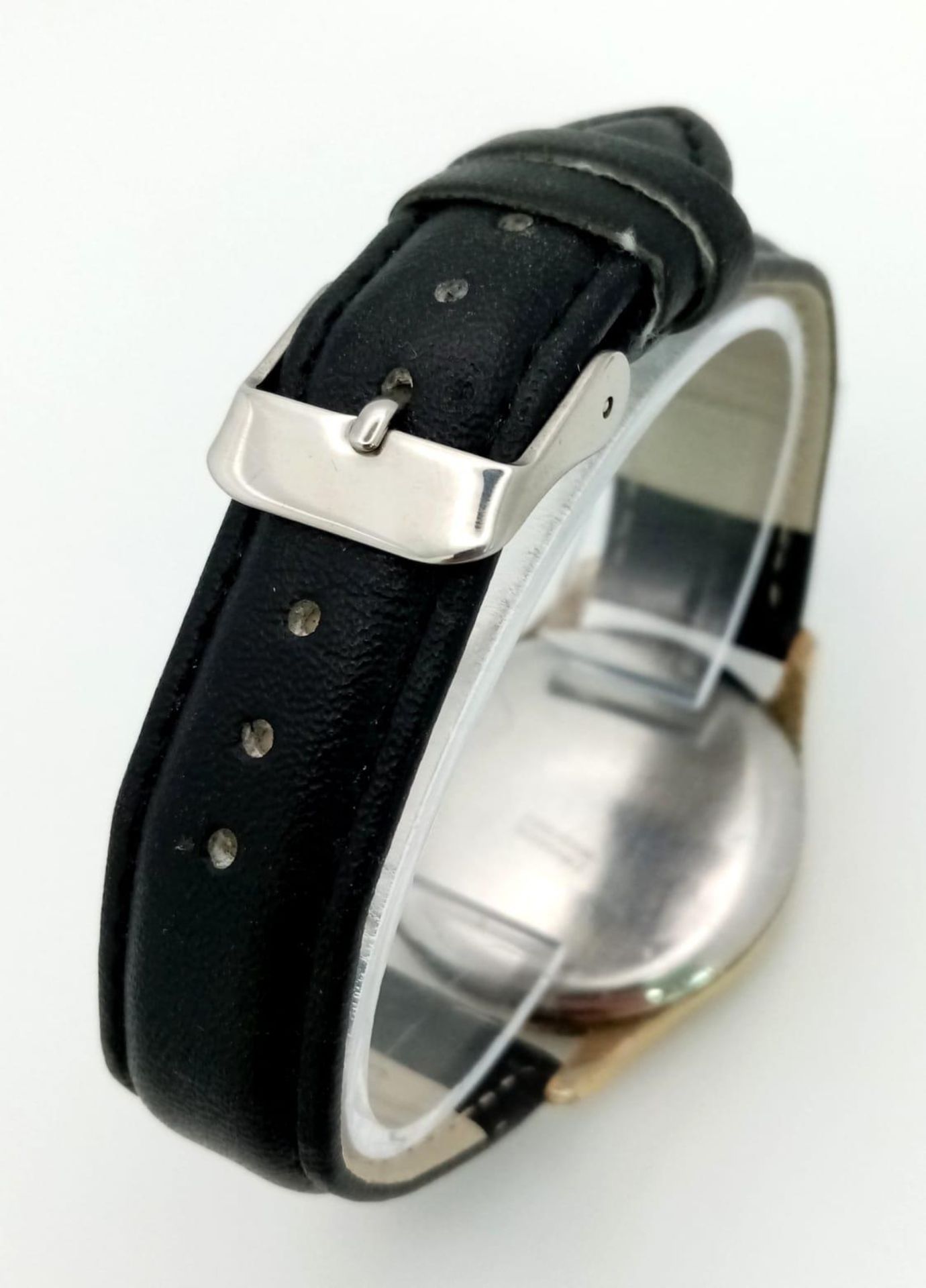 A Vintage Dichi Gents Mechanical Watch. Black leather strap. Stainless steel gilded case - 35mm. - Image 4 of 5