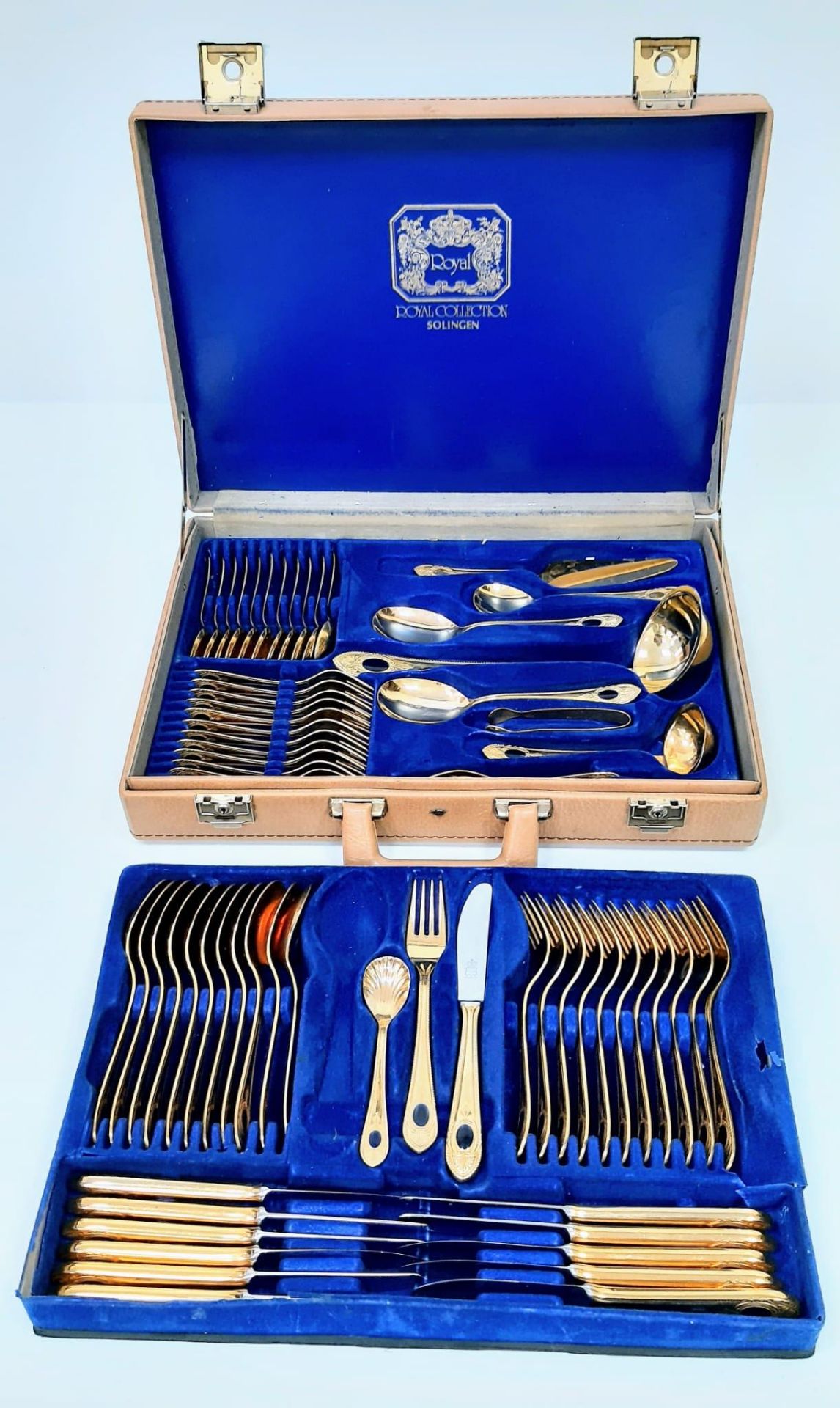 A Royal Collection of Cased Cutlery Set By Solingen. 18k Gold Plated 69 Piece Set. Comes In a Custom