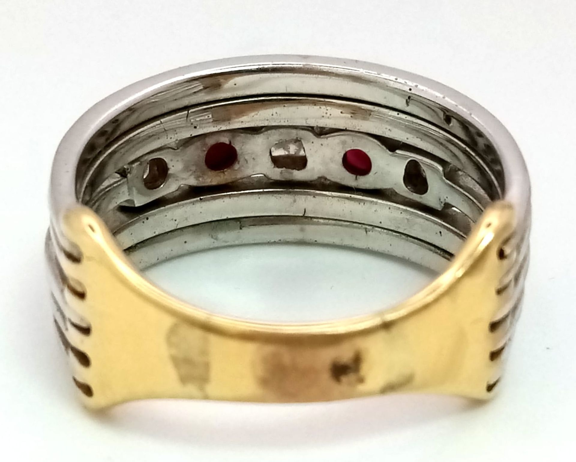 A Statement 18k Yellow, White Gold and Gemstone Band Ring. A Central reservation of oval rubies - Image 6 of 8