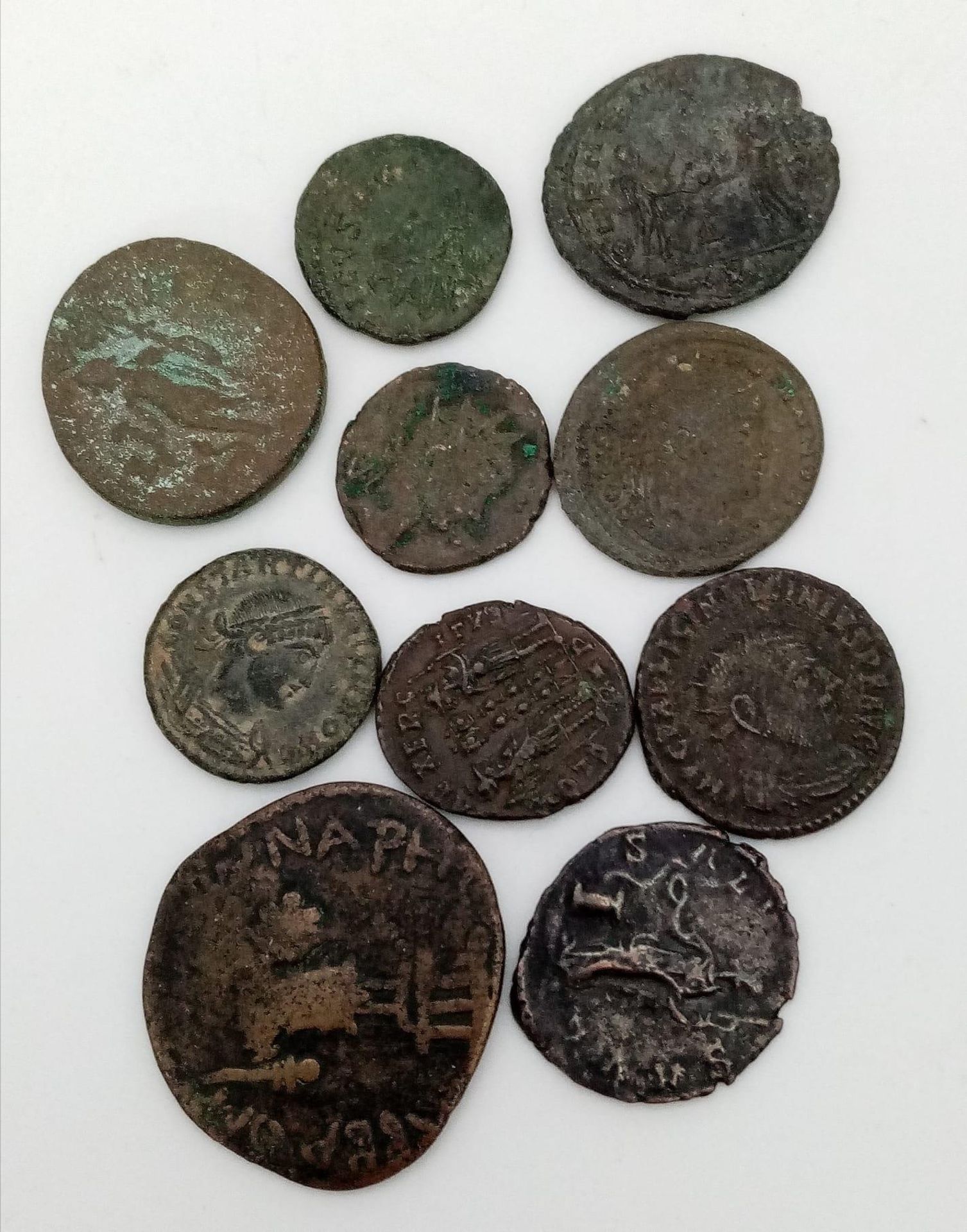 Ten Very Collectible Roman Coins. Please see photos for Finer Details.