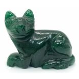 A HAND CARVED FIGURE OF A RESTING CAT MADE FROM JADE . 53.3gms 4 x 5cms