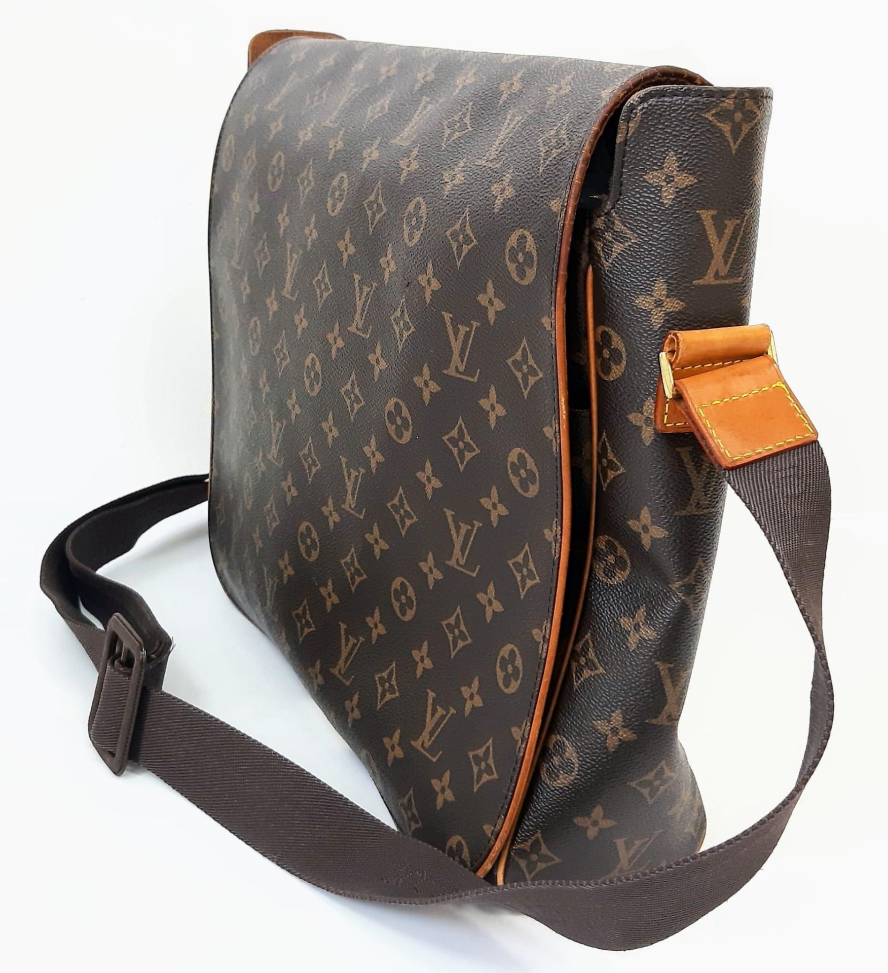 A Louis Vuitton Abbesses Messenger Bag. Monogram canvas exterior with brown leather trim. Sturdy - Image 5 of 7