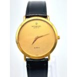 A Classic Raymond Weil Geneve Gold Plated Quartz Gents Watch. Black leather strap. Gold plated