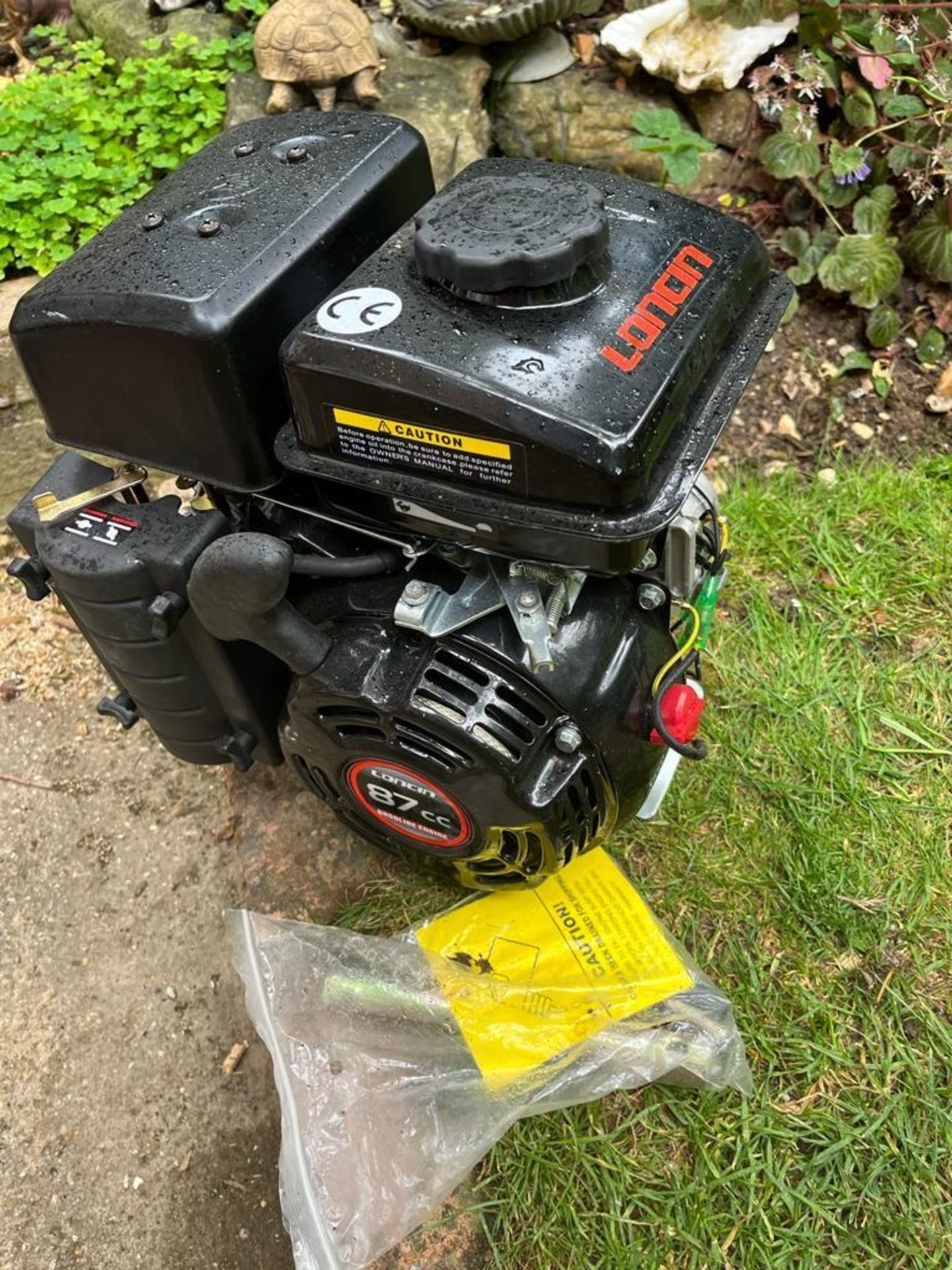 A LIGHTLY USED MOWER ENGINE INGOOD WORKING ORDER.