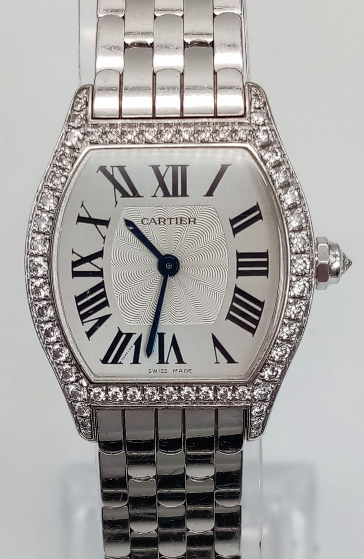 A Cartier Tortue 18K White Gold and Diamonds Ladies Watch. 18k white gold bracelet and case - 30mm x