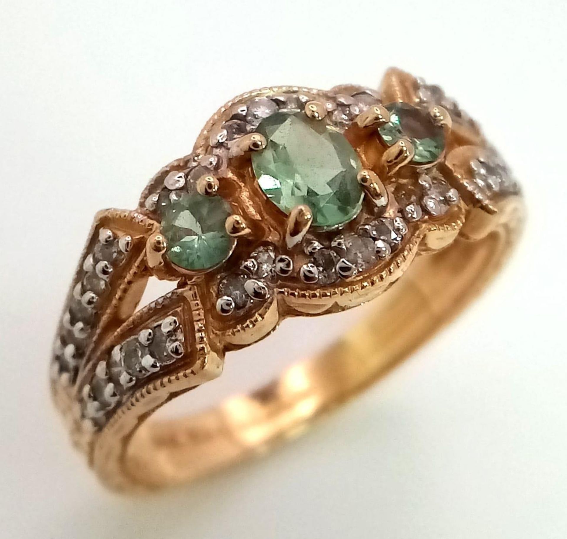 14K YELLOW GOLD DIAMOND & GREEN TOPAZ FANCY RING. TOTAL WEIGHT 4.3G. SIZE O - Image 2 of 4