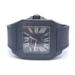 A Stylish Cartier Santos 100 Automatic Gents Watch. Leather and textile strap. Black stainless steel