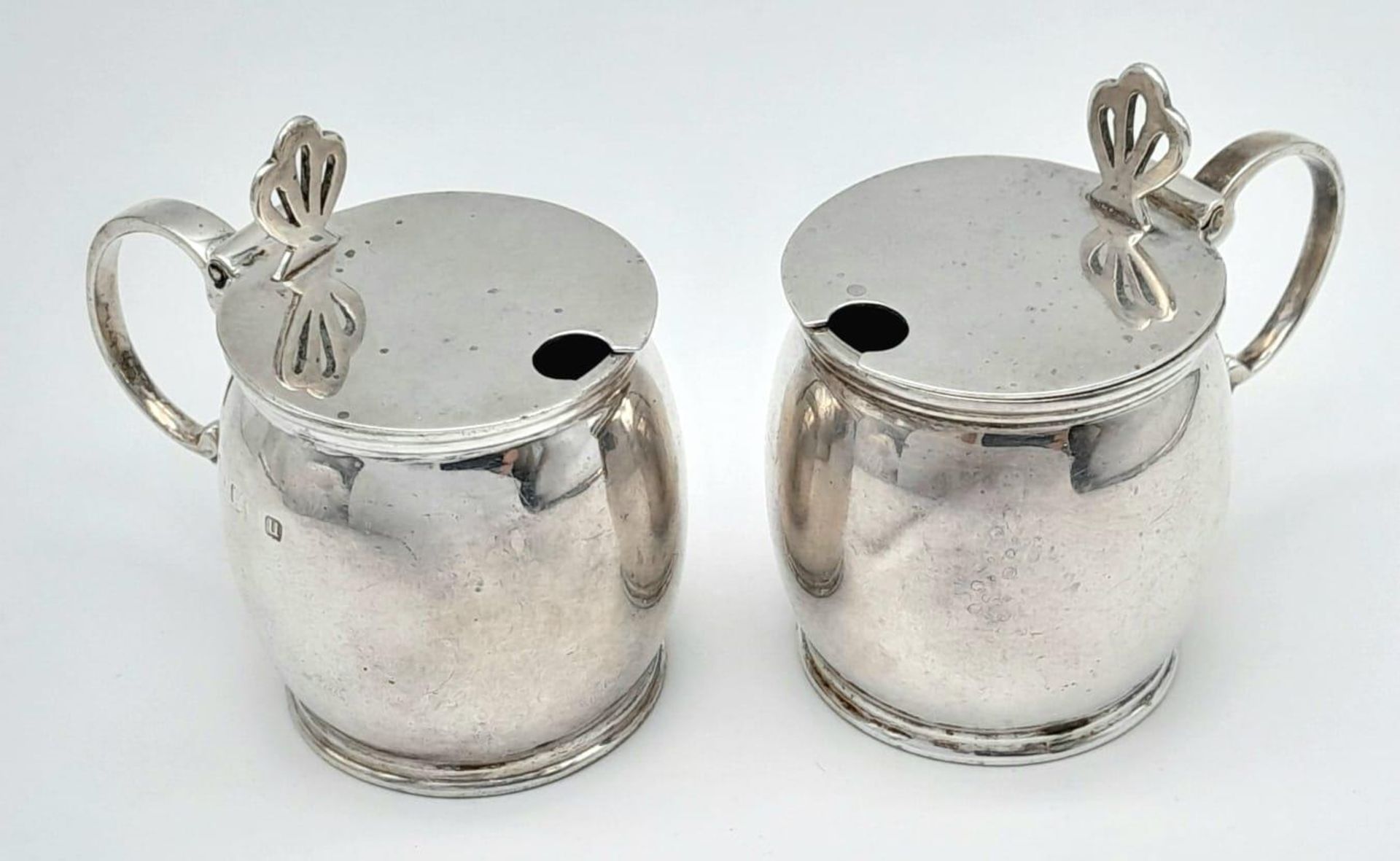 An antique pair of silver condiment set ( missing glass ). Full hallmark Birmingham, sterling