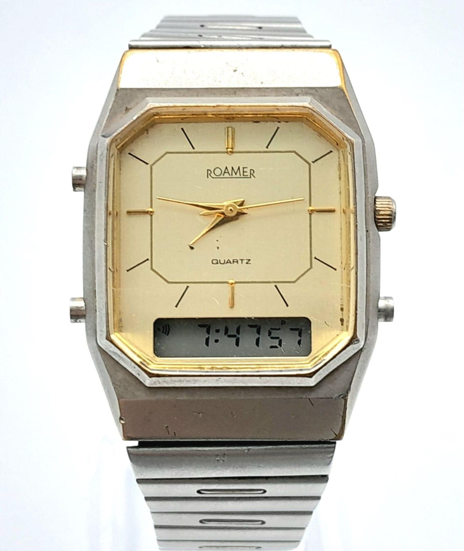A Rare Vintage Roamer Digital and Analogue Watch. Stainless steel strap and octagonal case - 29mm.