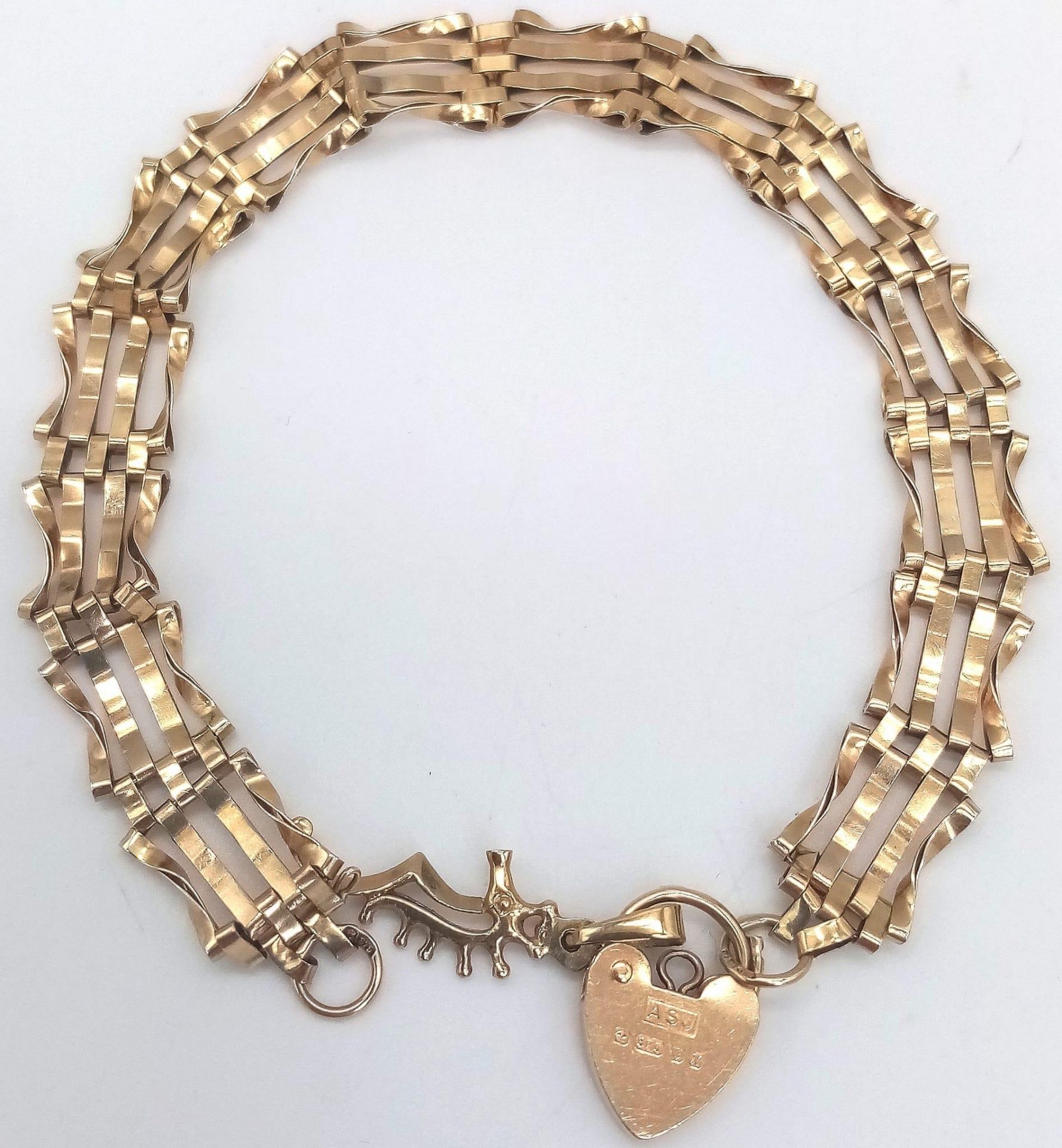 A Vintage 9K Yellow Gold Gate Bracelet with Heart Clasp and Seahorse Charm. 18cm. 5.2g