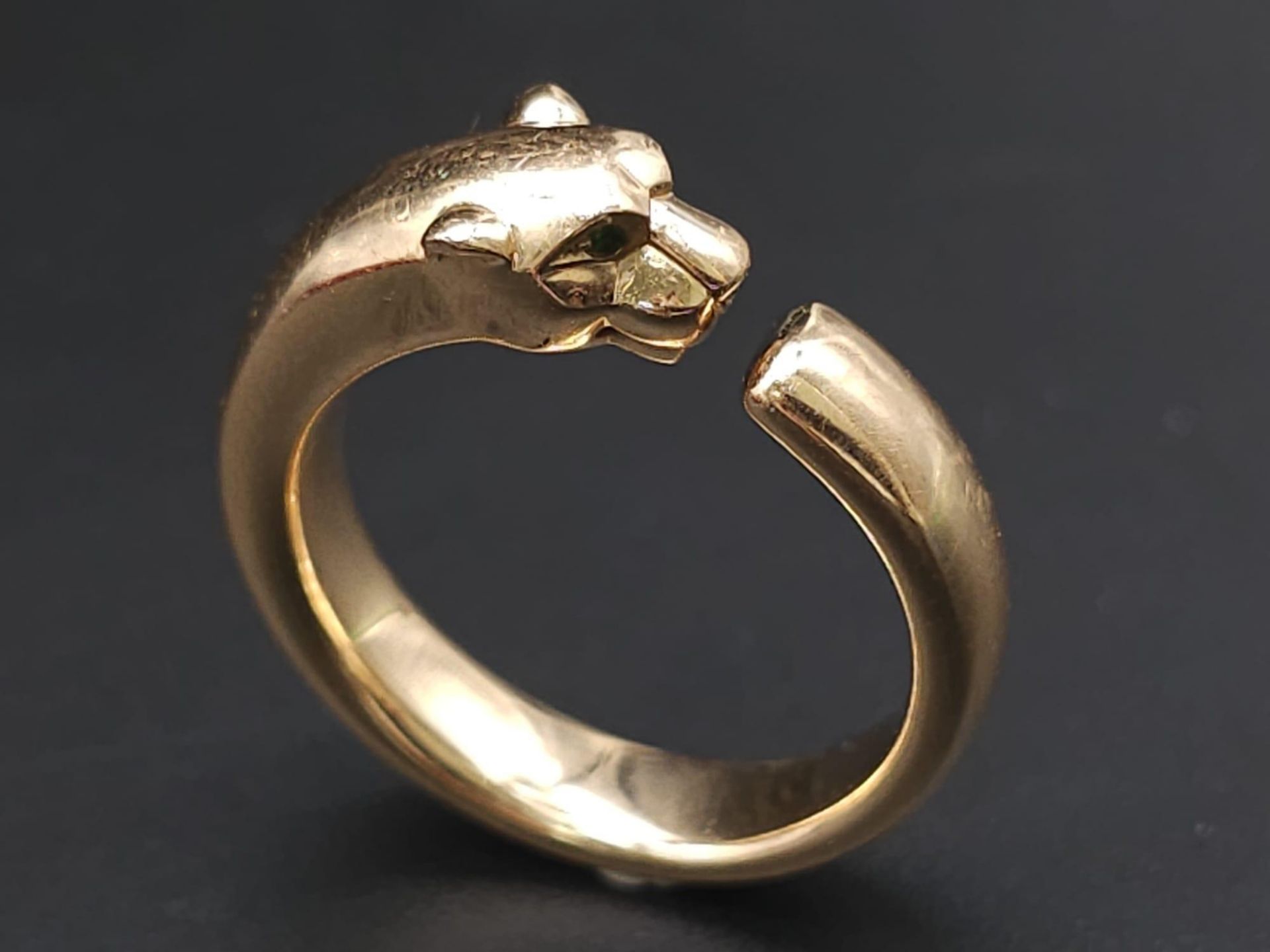 A Cartier 18K Rose Gold Panther Ring with Onyx and Tsavorite Eyes. Size O. 11.1g total weight. Comes - Image 3 of 11