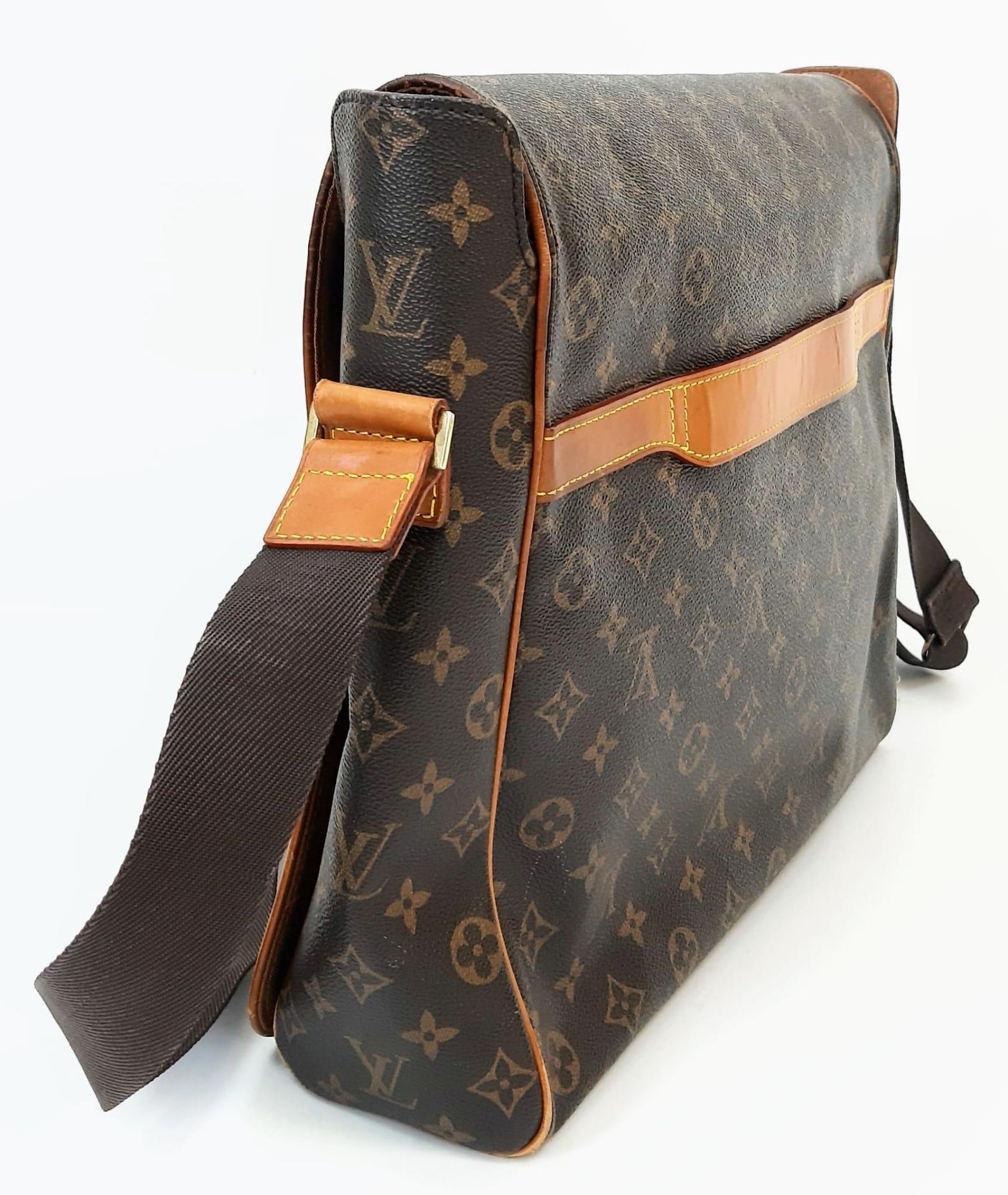 A Louis Vuitton Abbesses Messenger Bag. Monogram canvas exterior with brown leather trim. Sturdy - Image 4 of 7