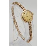 A Vintage 9K Gold Garrard Ladies Watch. 9K gold bracelet and case - 17mm. Mechanical movement. In