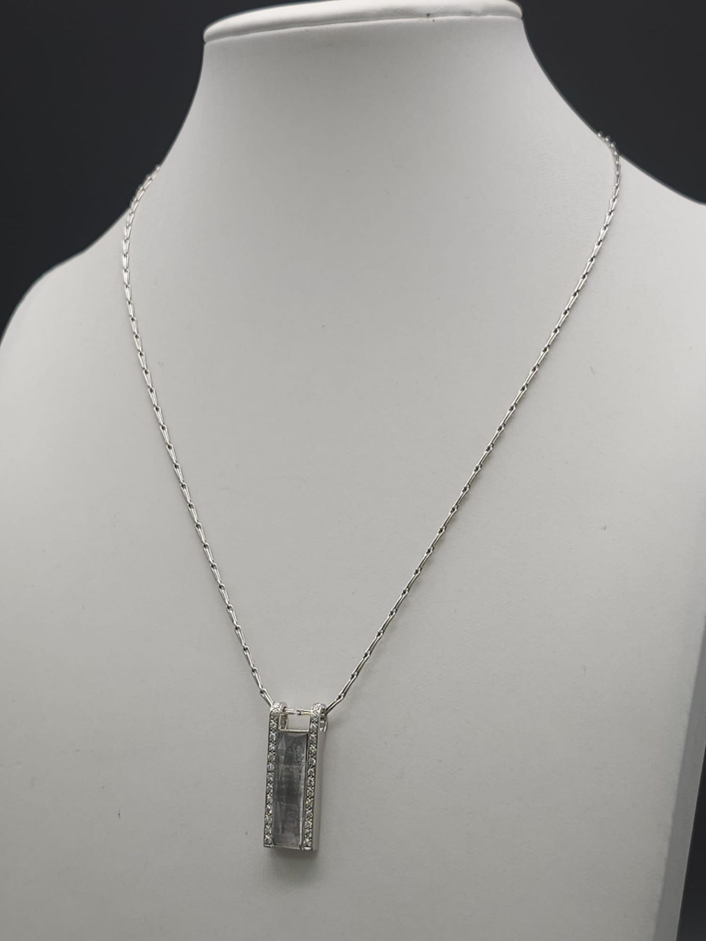 An 18K White Gold Rutilated Quartz and Diamond Pendant on an 18K White Gold Link Necklace. A - Image 9 of 10