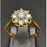A 18K YELLOW GOLD DIAMOND CLUSTER RING 0.40CT. TOTAL WEIGHT 3.35G. SIZE N.