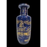 An Antique Chinese Cobalt Blue Ceramic Tall Vase Decorated with a Gilded Village Scene with