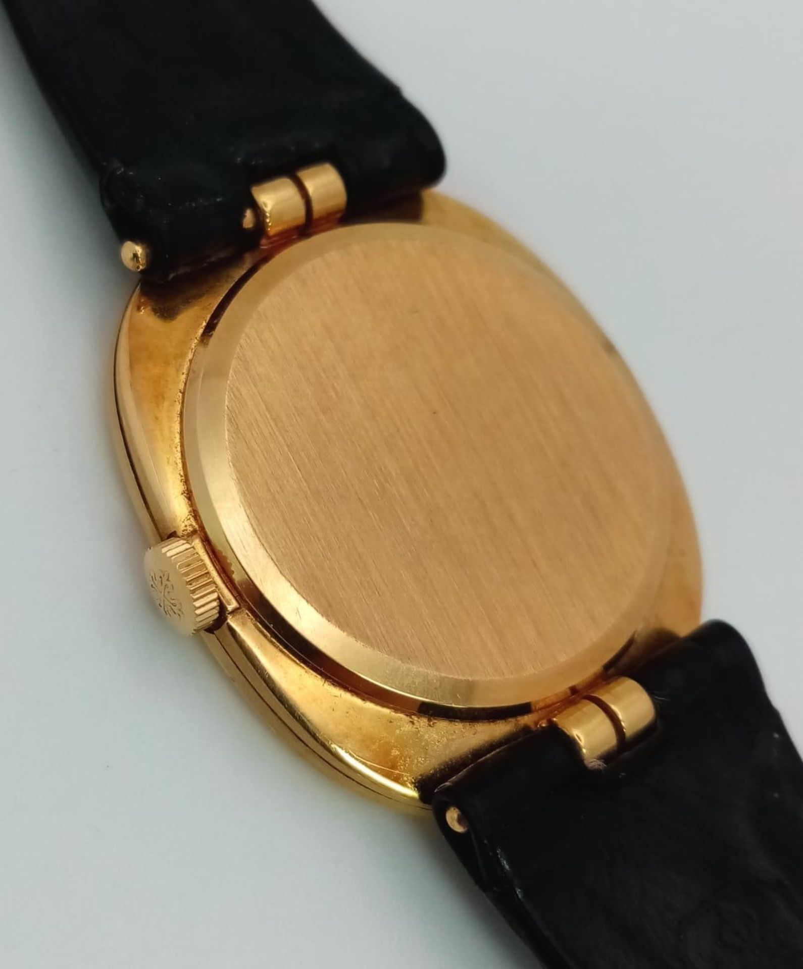 A Vintage Patek Phillipe 18K Gold Gents Watch. Original black leather strap with 18k gold buckle. - Image 6 of 8