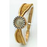 A Vintage Patek Phillipe 18K Gold and Diamond Ladies Watch. 18k gold hallmarked bracelet and