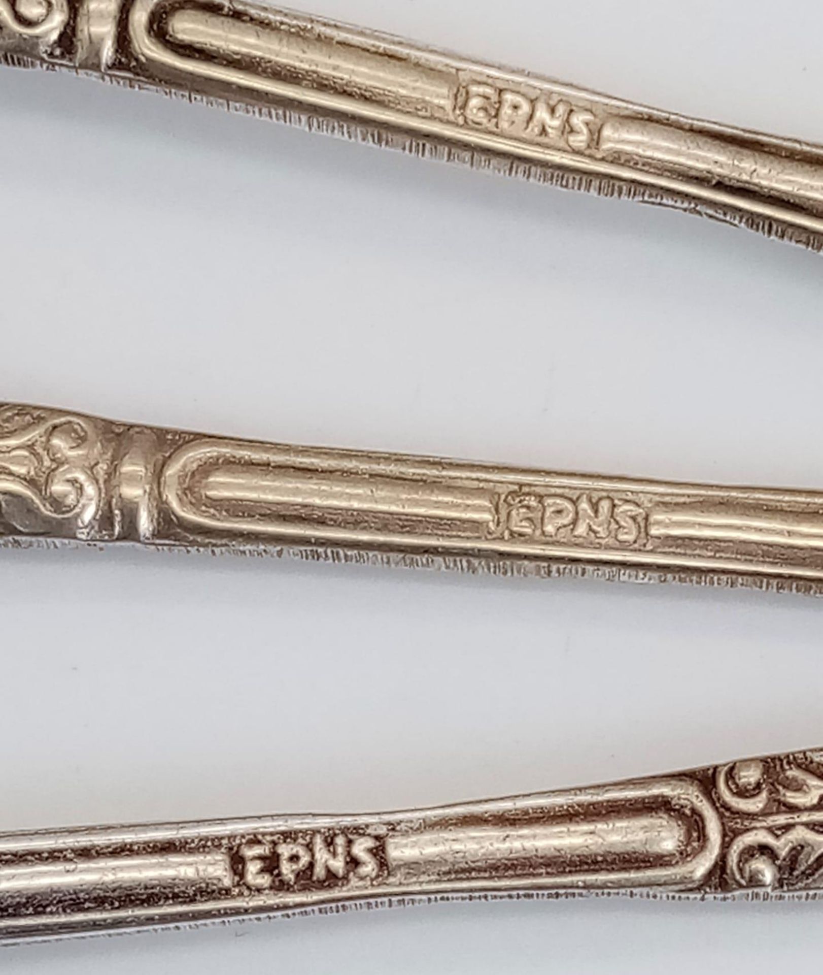 A Box Filled with 6x EPSN silver plate Teaspoons . 14 x 13x 2cm. - Image 9 of 15