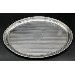 A Small Antique 925 Silver Oval Tray. Machine tooled geometric decoration with empty cartouche.