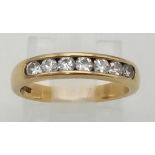 A Vintage 18K Yellow Gold Diamond Half Eternity Ring. Seven round cut diamonds. Size J. 2.8g total