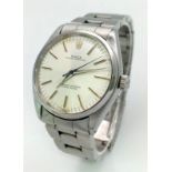 A Rolex Oyster Perpetual Automatic Gents Watch. Stainless steel strap and case - 35mm. Silver tone