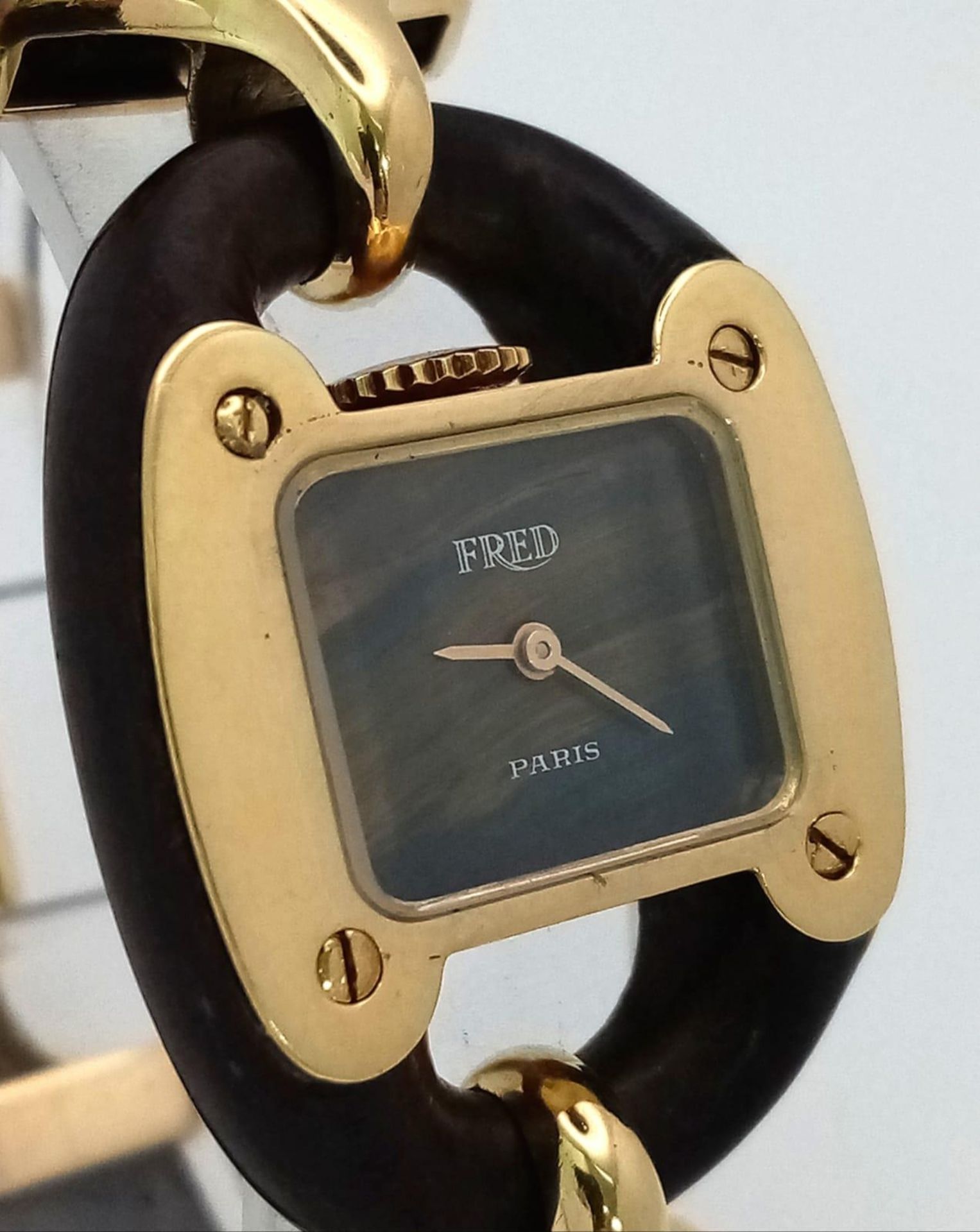 A very rare Fred of Paris 18K Gold Ladies Watch. Black leather and gilded metal bracelet. 18k gold - Image 4 of 13