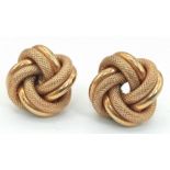 A Pair of 9K Yellow Gold Knot Earrings. Smooth and geometric patterns entwined. 4.95g total weight.