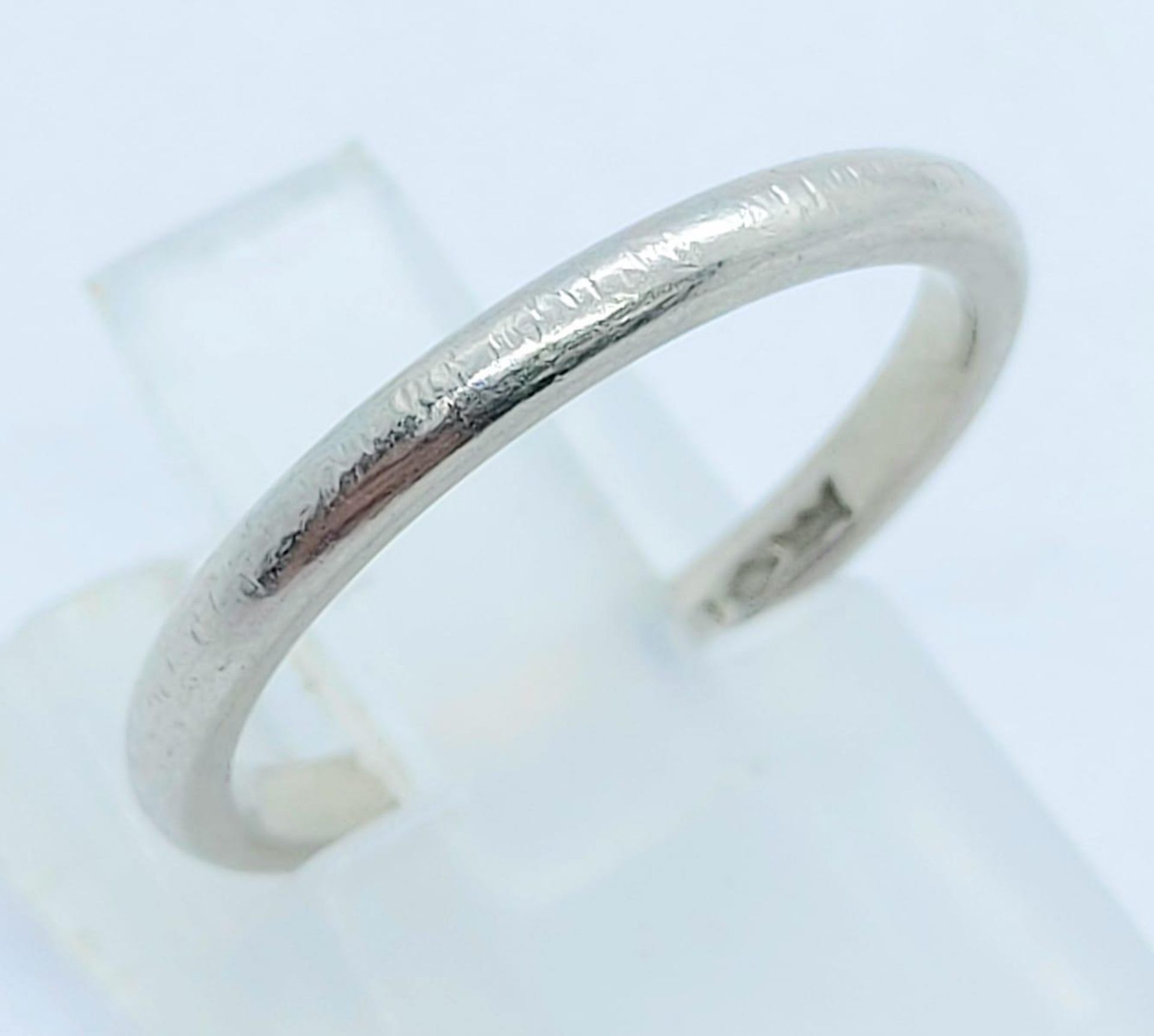 A 950 Platinum Band Ring. Size K. 3.05g weight.