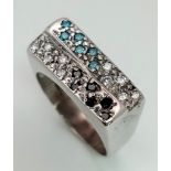 A Stylish 9K White Gold Topaz and Diamond Ring. Size L. 4.6g total weight.