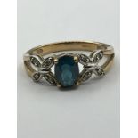 Fabulous 9 carat YELLOW GOLD,AQUAMARINE and DIAMOND RING. Consisting an oval cut AQUAMARINE