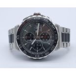 A Tag Heuer Formula 1 Chronograph Gents Watch. Steel and ceramic strap and case - 43mm. Silver