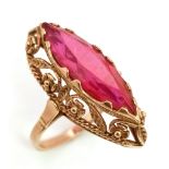 A 14K gold Ruby ring with nicely ornate decoration. Total weight 6.63 grams. Size Q. 13698