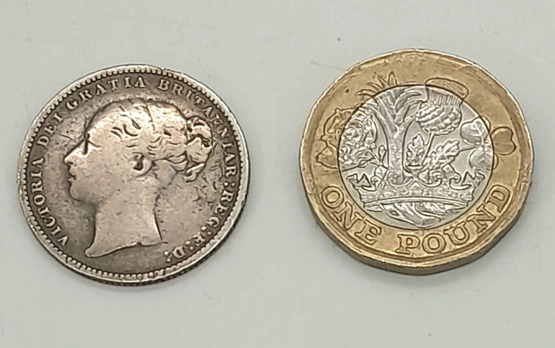 An 1879 Queen Victoria Silver Shilling. Please see photos for conditions. - Image 3 of 3