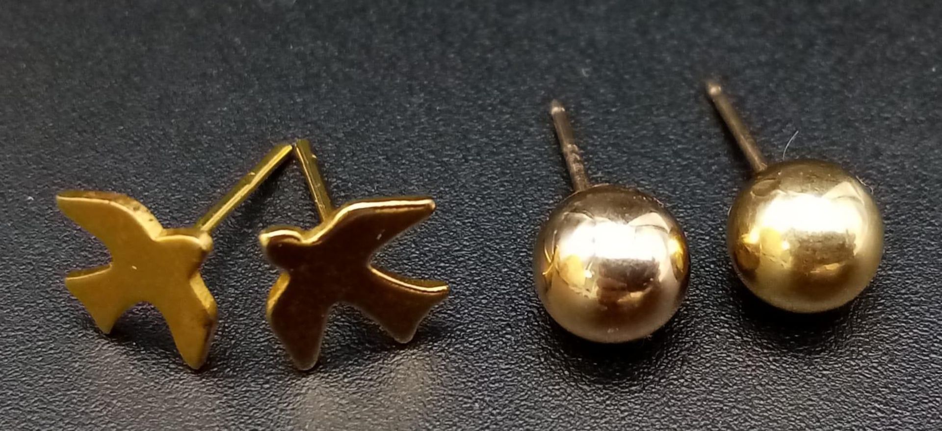 Two Pairs of 9K Yellow Gold Earrings - Starlings and Balls. 0.6g (no butterflies).