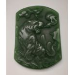 A Chinese Green Jade Rectangular Tiger Pendant. 5cm x 3.5cm