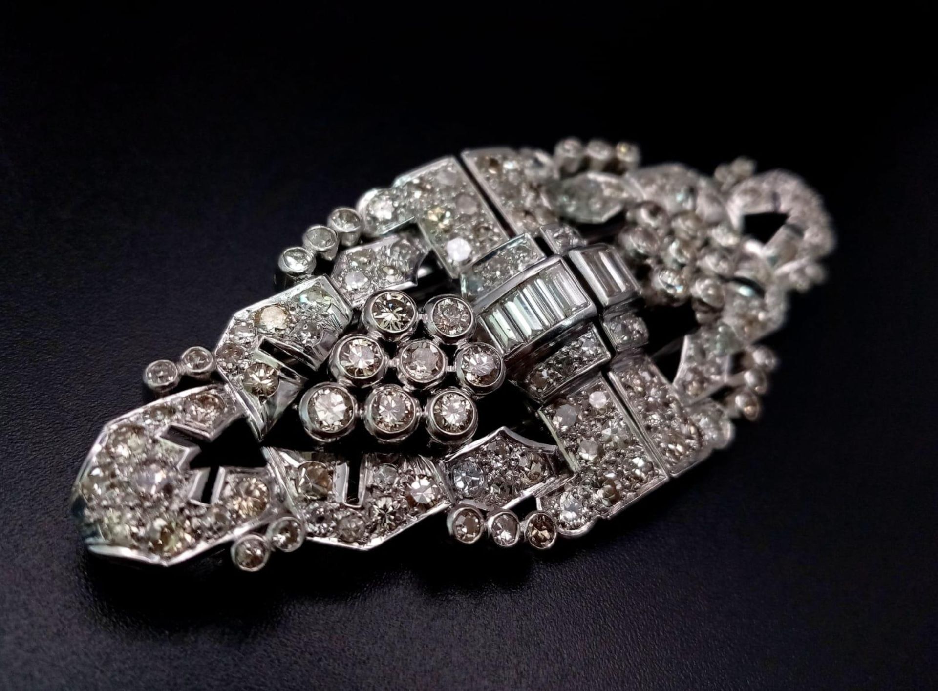 An Art Deco Style 18K White Gold and Diamond Double Clip Brooch. 2ct approx. of round brilliant