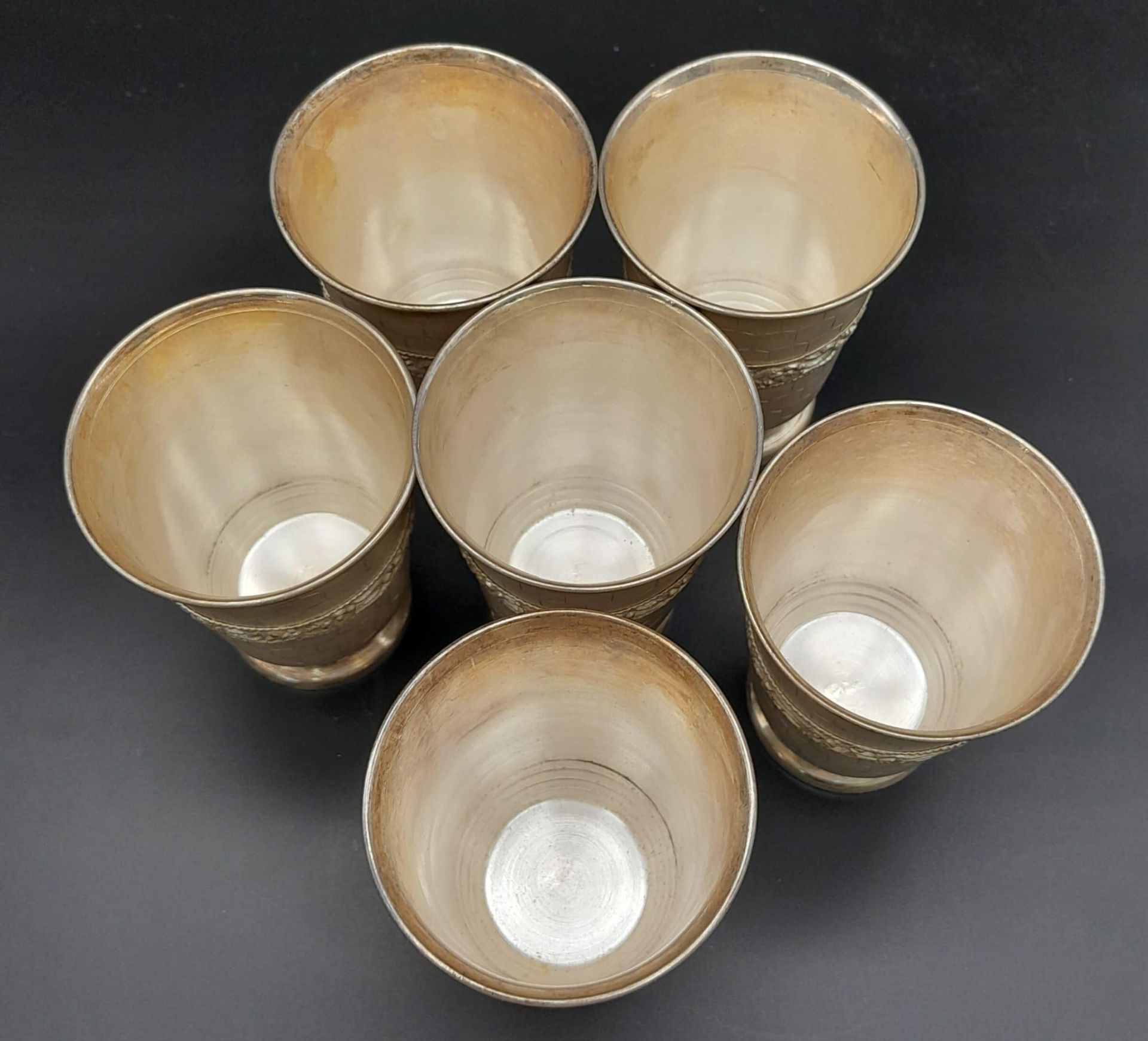 A Wonderful Vintage Set of Six Indian Silver Cups. Paved honeycomb and floral decoration. 449g of - Image 5 of 11