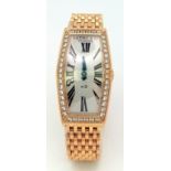 A BEDAT AND CO 18K GOLD LADIES WRIST WATCH WITH DIAMOND BEZEL AND SOLID 18K GOLD STRAP, UNIQUE