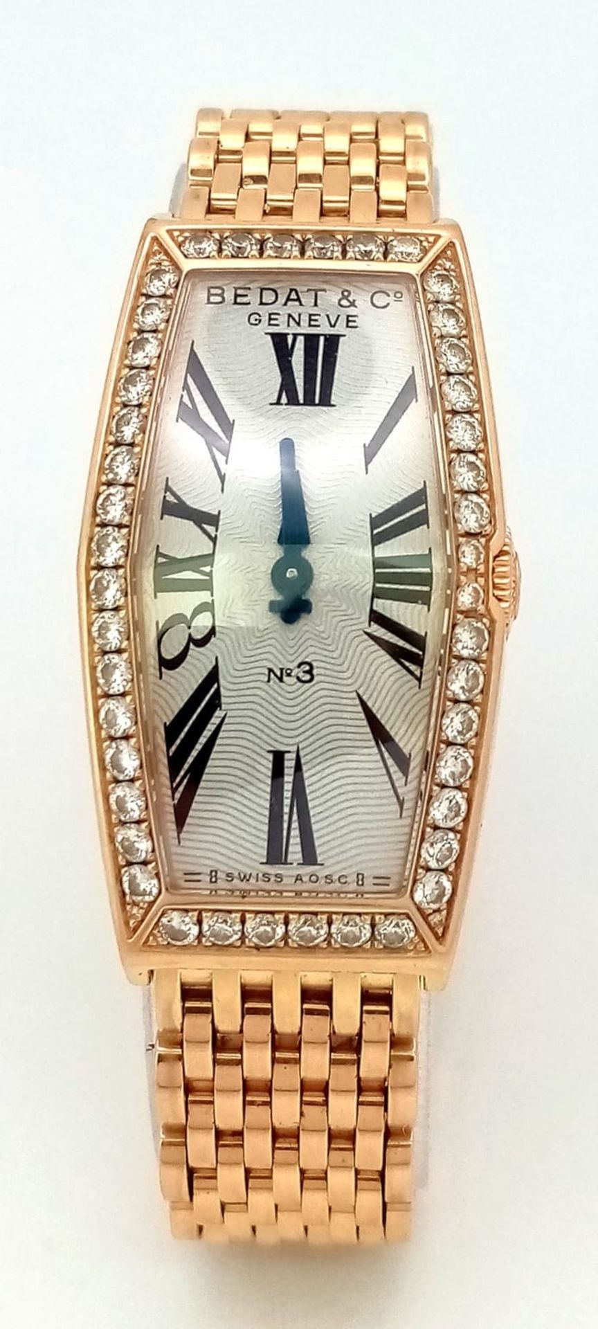 A BEDAT AND CO 18K GOLD LADIES WRIST WATCH WITH DIAMOND BEZEL AND SOLID 18K GOLD STRAP, UNIQUE