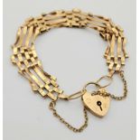 A Vintage 9K Yellow Gold Gate Bracelet with Heart Clasp. 17cm. 8.45g weight