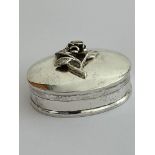 Vintage SILVER PILL BOX, Oval shape having raised ROSE and STEM detail to lid. Full UK hallmark. 3.7
