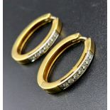 A PAIR OF 18K YELLOW GOLD 0.40CT DIAMOND SET EARRINGS. TOTAL WEIGHT 10.8G.