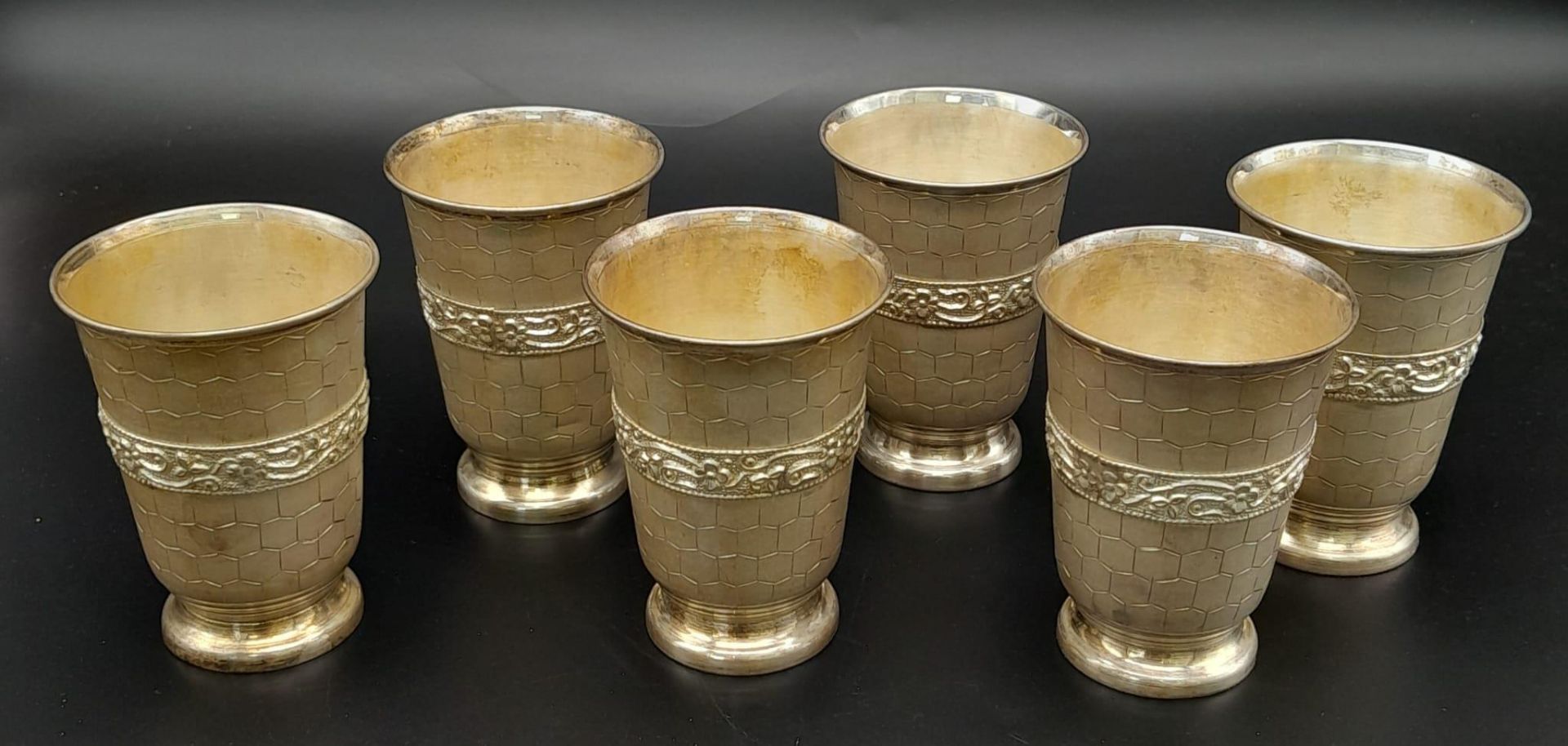 A Wonderful Vintage Set of Six Indian Silver Cups. Paved honeycomb and floral decoration. 449g of - Image 3 of 11