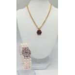 Two Wonderful Pieces of Jewellery: An 18k Yellow Gold Garnet Pendant on an 18K Yellow Gold Chain -