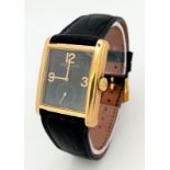 A PATEK PHILIPPE VINTAGE 18K GOLD TANK STYLE WATCH WITH A SUBDIAL AND GEOMETRIC DESIGN ON THE FACE ,