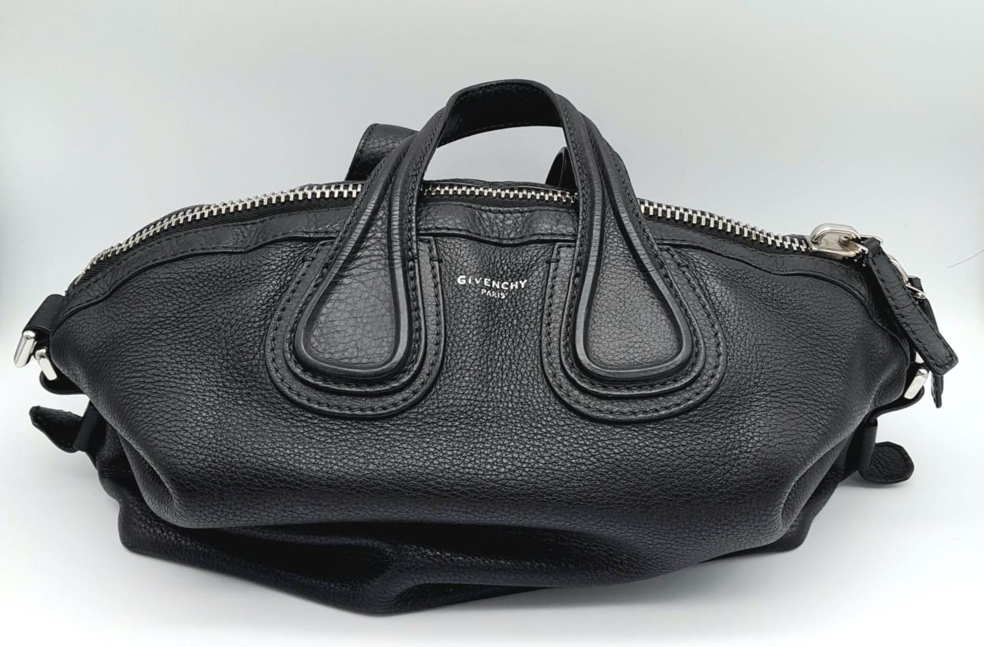 A Givenchy Black Grained Leather Nightingale Shoulder Bag. Come with a detachable shoulder strap.